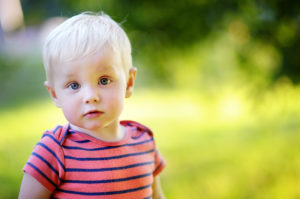 Outdoor portrait of toddler boy